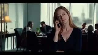 woman talking on phone in restaurant — Jurassic World