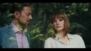 Man and woman standing in forest — Jurassic World