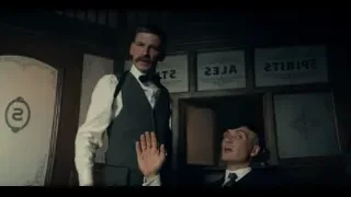 two men in suits, one holding gun — Peaky Blinders