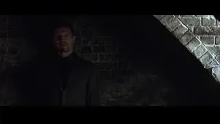 Man standing in dark tunnel — Batman