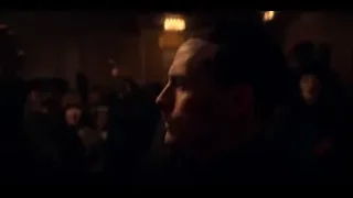 man raising arm to cheering crowd — Peaky Blinders