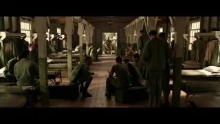 Men in prison cell with bunk beds — Hacksaw Ridge
