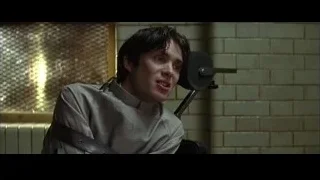young man speaking into microphone — Batman