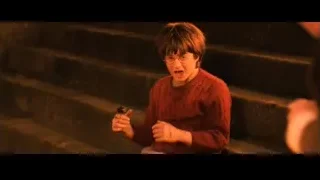 person sitting on dark stairs — Harry Potter and the Philosophers Stone