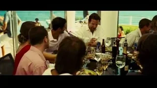 people dining at restaurant with ocean view — Limitless