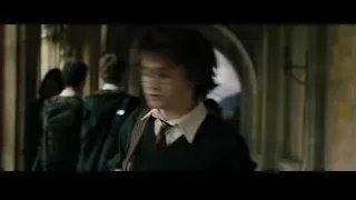 two young men in tense hallway conversation — Harry Potter and the Goblet of Fire