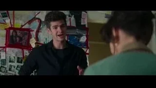 man and woman talking near bulletin board — The Amazing Spider Man 2