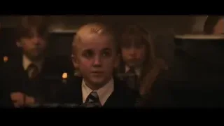 Girl in suit sitting at piano — Harry Potter and the Philosophers Stone