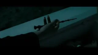 man holding a wand — Harry Potter and the Deathly Hallows 2