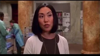 woman in room with columns — Spider Man