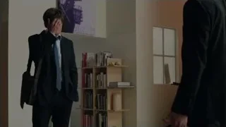 two men talking by a bookshelf — Suits