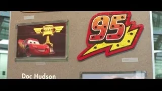 sign with car and text — Cars 3