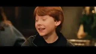 young boy with red hair smiling — Harry Potter and the Philosophers Stone