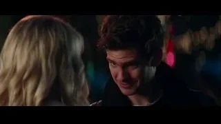 man and woman in dimly lit room — The Amazing Spider Man 2