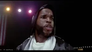 man with beard under spotlights — Rocky III