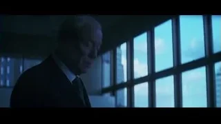 elderly man in suit by large window — Batman: The Dark Knight