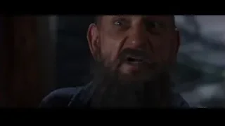 man with beard looking at camera — Iron Man 3