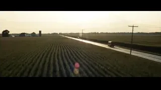 Truck driving on road in agricultural field — Superman: Man of Steel