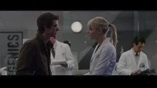 Man and woman conversing in laboratory — The Amazing Spider Man