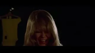 Blonde woman smiling in dimly lit room — Bruce Lee: Enter The Dragon