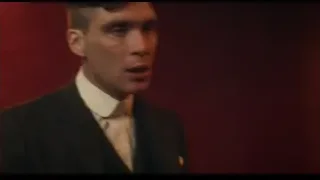 young man in suit with red wall spotlight — Peaky Blinders