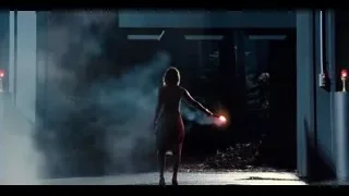 person with red light saber in tunnel — Jurassic World