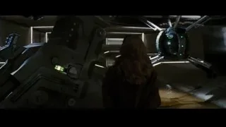 man and woman in dimly lit futuristic room — Batman: The Dark Knight Rises
