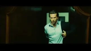 man looking at factory image on screen — Limitless