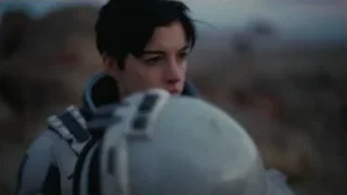 person in white spacesuit — Interstellar