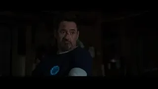 Man with beard in dimly lit room — Iron Man 3