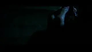 hand holding blue lit object in dark — Now You See Me 2