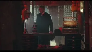 man in suit standing behind desk — Peaky Blinders