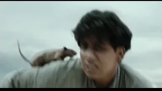 Person holding rat on boat — Life of Pi
