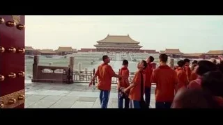 Children in orange uniforms at golden-domed temple — The Karate Kid