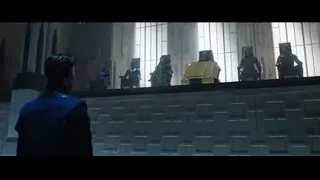 Futuristic armored characters around yellow car — Doctor Strange 2