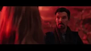 Man with beard in black coat red background — Doctor Strange 2
