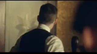 man in vest in dimly lit room — Peaky Blinders