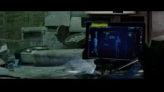 computer monitor with human figure on desk — The Amazing Spider Man