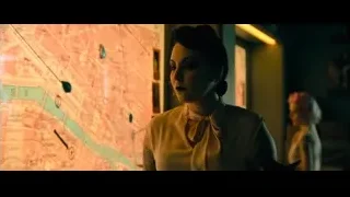 woman looking at city map — John Wick: Chapter 4