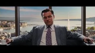 Man pointing in office with city view — The Wolf Of Wall Street