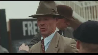 Two men with gun, one distressed — Peaky Blinders