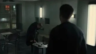 man in black coat in dimly room — Blade Runner 2049
