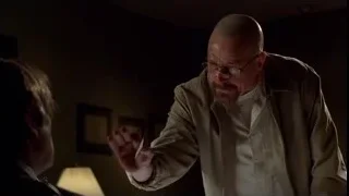 Walter White gesturing in dimly lit room — Breaking Bad