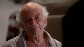 People in ornate room with computer monitor — Breaking Bad