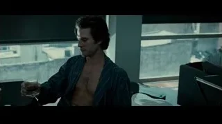 Young man shirtless drinking in living room — Limitless