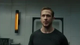 man in black sweater by orange lamp — Blade Runner 2049
