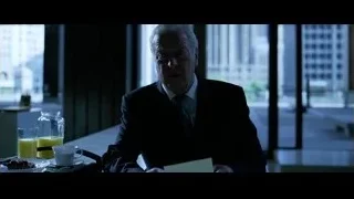 elderly man deep in thought at restaurant — Batman: The Dark Knight