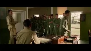 military men shaking hands at desk — Hacksaw Ridge