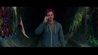 young man on phone in graffiti tunnel — The Amazing Spider Man 2