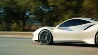 white sports car driving on road — Sports Cars